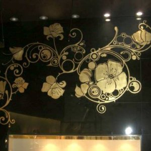 Decorative gilding on a jewellers shop interior wall