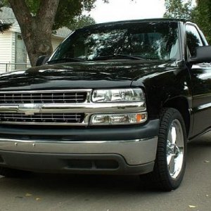 2001 Chev Silverado shortbox. 4.8l with Air Raid intake, Flowmaster delta series exhaust, single in dual out, debadged, tint, chrome grille, TYC light