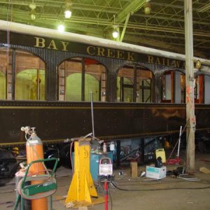 Lettering and striping on restored railcar