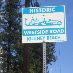 Road Sign image for local historical steam boat docks.