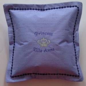 Personalized cushion which I digitized, embroidered and assembled.