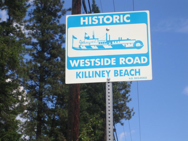 Road Sign image for local historical steam boat docks.