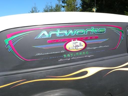 shop truck passenger side details. candy colours over spun silver leaf.....really pops when the sun hits it!! also has my hot-rod Peterbilt illustrati