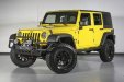 Yellow Jeep Wrangler Unlimited.jpg