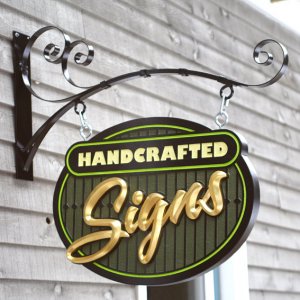 Scroll bracket for sandblasted sign