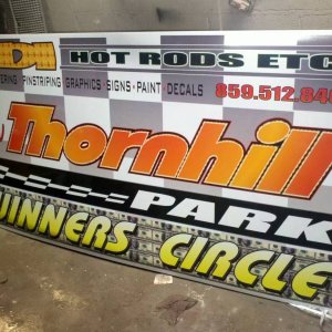 winners circle sign