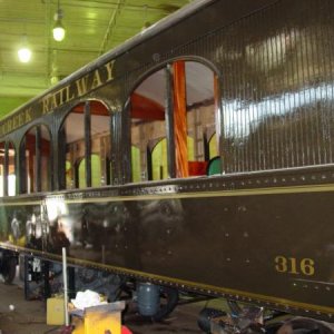 Lettering and striping on restored railcar