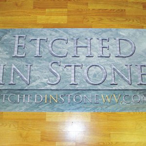 Etched in Stone banner