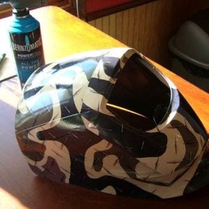 Welding helmet wrap for a John Deere employee