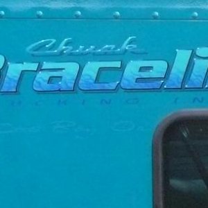 Chuck Bracelin truck. he's got a fleet of these beautiful Peterbilts...and all have these flamejob lettering logos on 'em