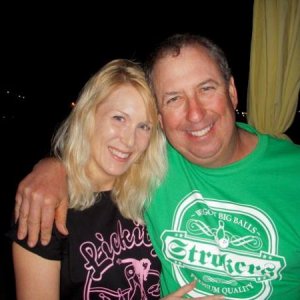 My husband and I wearing our shirts on bowling night with friends.
