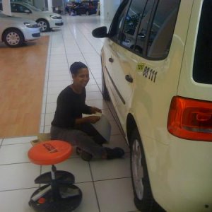 Mrs JR wrapping a Taxi! Good job!