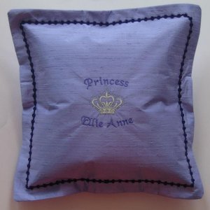 Personalized cushion which I digitized, embroidered and assembled.
