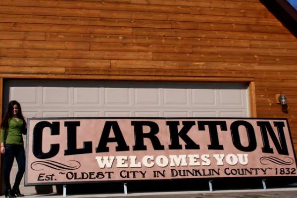 16ft by 4ft City of Clarkton Missouri. Hdu, hand painted with a faux old document background.