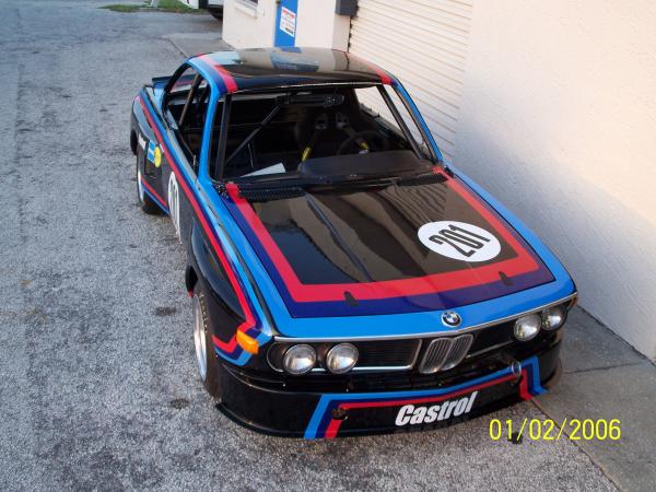 1974 BMW 3.0 CSL Alpina. We installed three different color stripes all around the car after it was repainted black.  This is how it would of looked i