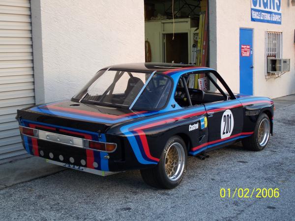 1974 BMW 3.0 CSL Alpina. We installed three different color stripes all around the car after it was repainted black.  This is how it would of looked i