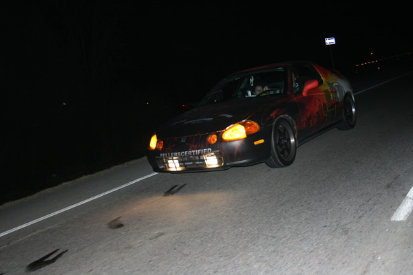 A simple night driving shot.  This wrap is Avery 1005EZ RS with Avery Matte Lam on it.  Headlights are Oracal 8300 Transparent Orange.

2008 into 20