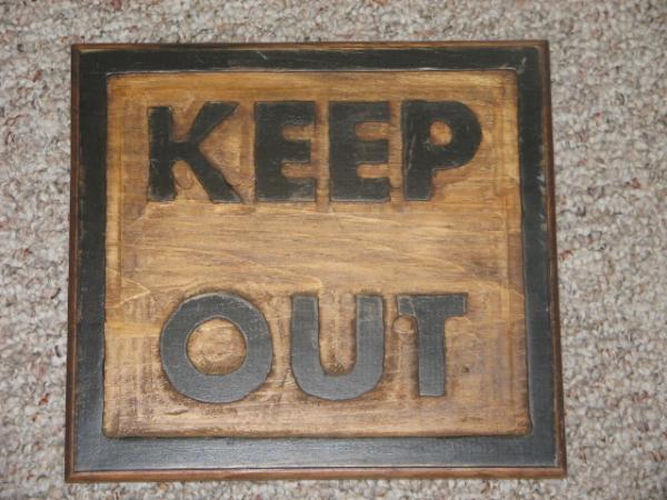 Carved sign using a router
