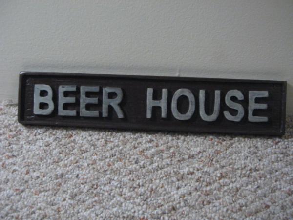 Carved wood sign with a router