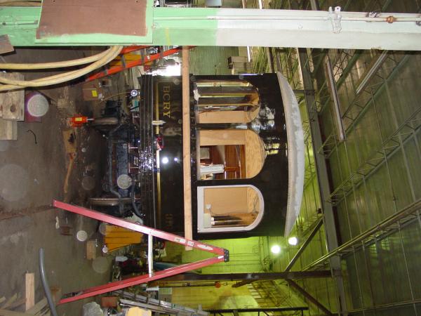 Lettering and striping on restored railcar