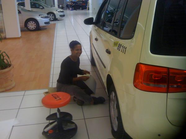 Mrs JR wrapping a Taxi! Good job!