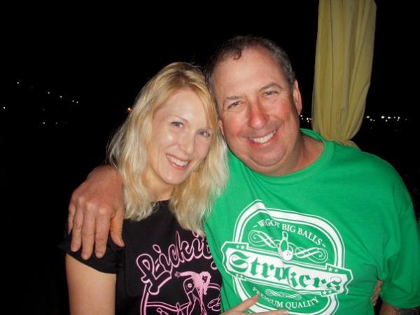 My husband and I wearing our shirts on bowling night with friends.