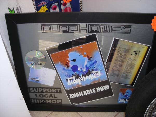 Old Pic and Frame turned into a Hip Hop Groups collection of Cds Bio and artwork.. 

Dubphonics.. I manage them. 

www.myspace.com/dubphonics