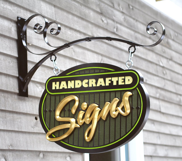 Scroll bracket for sandblasted sign