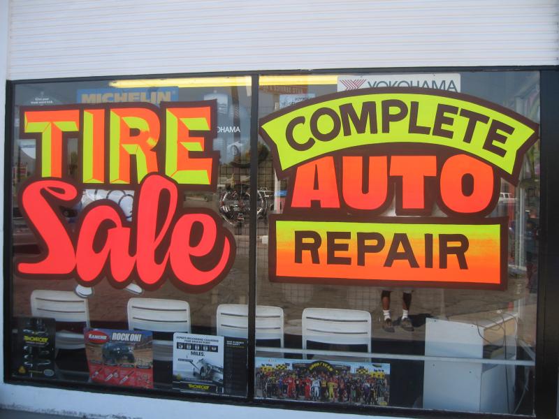 tire sale window painting