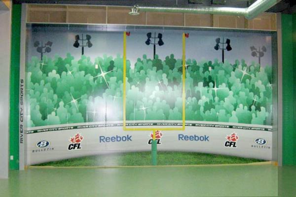We Wrapped the complete interior of River City Sports in Regina Sask. All walls and bulkheads were covered in vinyl. We even wrapped the shelving unit
