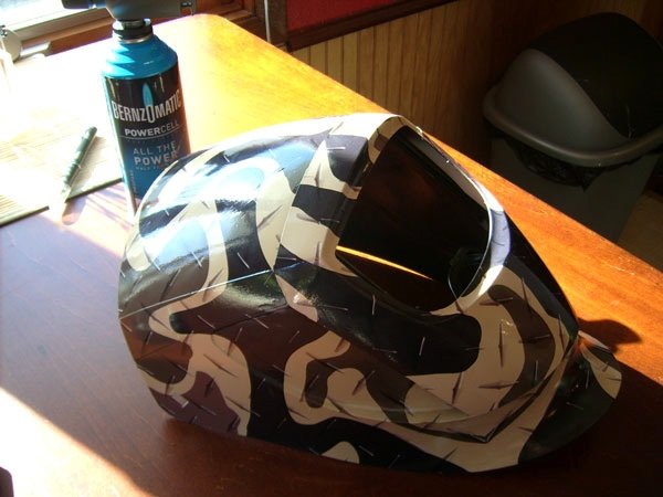 Welding helmet wrap for a John Deere employee